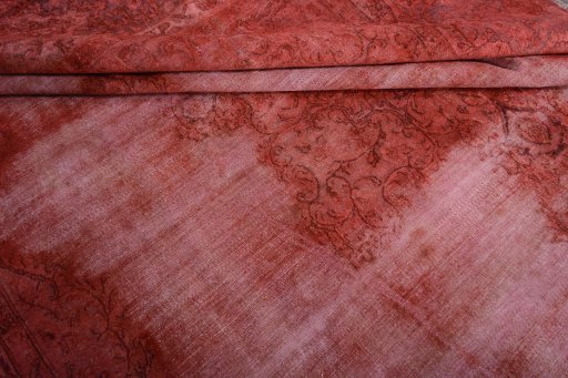 Surface texture of 1970s Vintage rug with natural Wool and intricate pattern