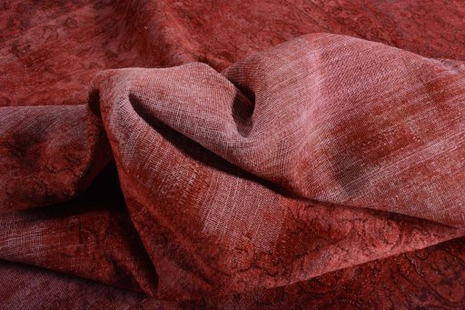 Backside of handmade 1970s Vintage rug showing knot structure and weave density