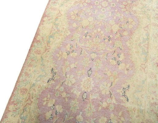 Backside of handmade 1970s Vintage rug showing knot structure and weave density