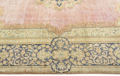 Corner detail of 1950s Vintage rug showing border pattern and Wool pile