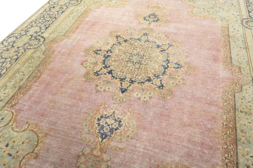 Backside of handmade 1950s Vintage rug showing knot structure and weave density