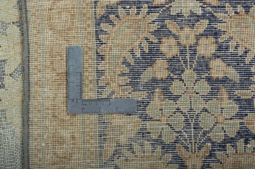 Backside of handmade 1970s Vintage rug showing knot structure and weave density