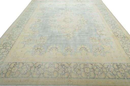 Surface texture of 1970s Vintage rug with natural Wool and intricate pattern