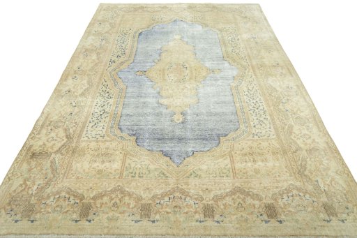 Surface texture of 1970s Vintage rug with natural Wool and intricate pattern
