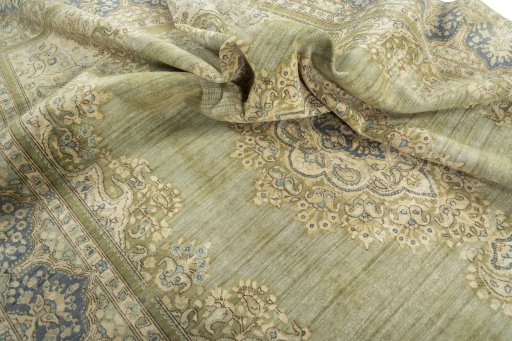 Surface texture of 1970s Vintage rug with natural Wool and intricate pattern