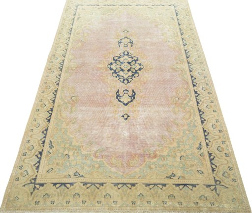 Surface texture of 1970s Vintage rug with natural Wool and intricate pattern