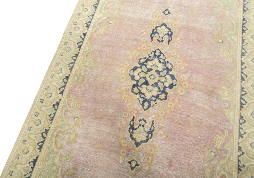 Backside of handmade 1970s Vintage rug showing knot structure and weave density