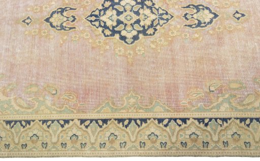 Corner detail of 1970s Vintage rug showing border pattern and Wool pile