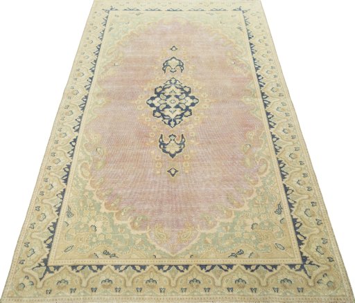 Surface texture of 1970s Vintage rug with natural Wool and intricate pattern