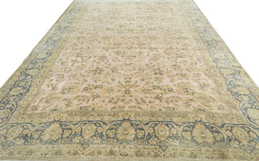 Surface texture of 1950s Vintage rug with natural Wool and intricate pattern