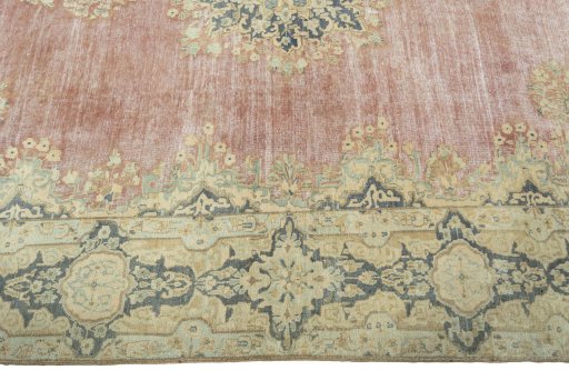 Corner detail of 1950s Vintage rug showing border pattern and Wool pile