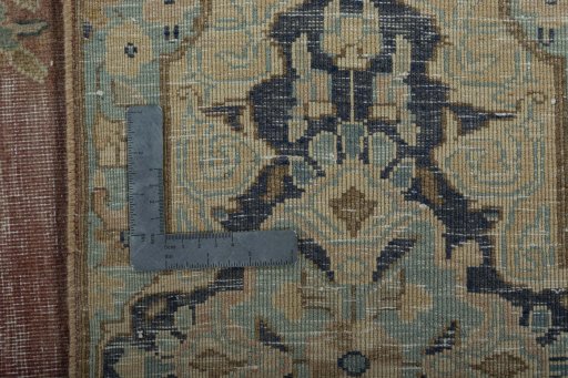 Backside of handmade 1950s Vintage rug showing knot structure and weave density