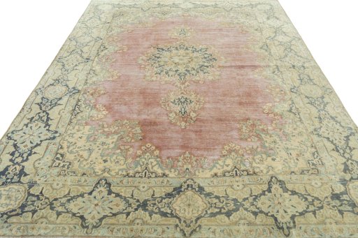 Surface texture of 1950s Vintage rug with natural Wool and intricate pattern