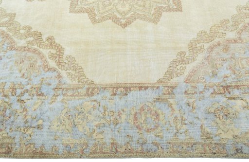 Corner detail of 1970s Vintage rug showing border pattern and Wool pile