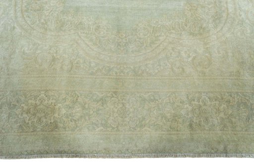 Full view of 1970s Vintage rug from Pakistan, 305 × 232 cm in Green tones