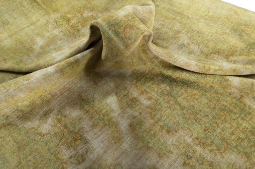 Surface texture of 1970s Vintage rug with natural Wool and intricate pattern