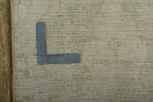 Backside of handmade 1970s Vintage rug showing knot structure and weave density