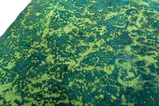 Backside of handmade 1970s Vintage rug showing knot structure and weave density
