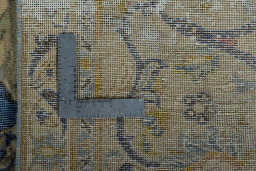 Surface texture of 1970s Vintage rug with natural Wool and intricate pattern