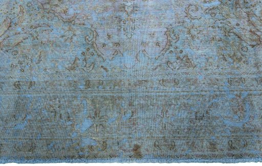 Backside of handmade 1970s Vintage rug showing knot structure and weave density