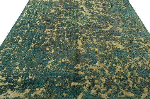 Surface texture of 1950s Vintage rug with natural Wool and intricate pattern