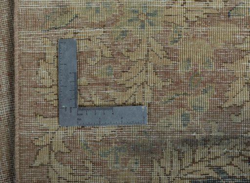 Surface texture of 1950s Vintage rug with natural Wool and intricate pattern