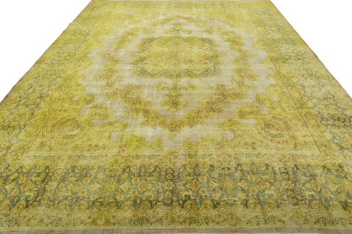 Surface texture of 1950s Vintage rug with natural Wool and intricate pattern