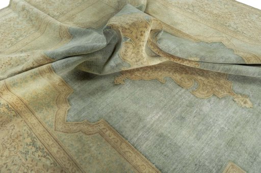 Surface texture of 1950s Vintage rug with natural Wool and intricate pattern