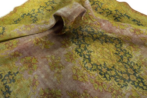 Surface texture of 1950s Vintage rug with natural Wool and intricate pattern
