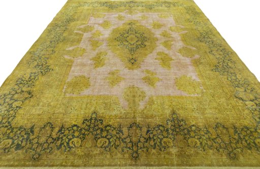 Surface texture of 1950s Vintage rug with natural Wool and intricate pattern