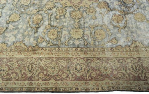 Corner detail of 1950s Vintage rug showing border pattern and Wool pile