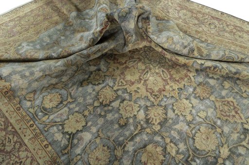 Surface texture of 1950s Vintage rug with natural Wool and intricate pattern