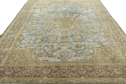 Surface texture of 1950s Vintage rug with natural Wool and intricate pattern
