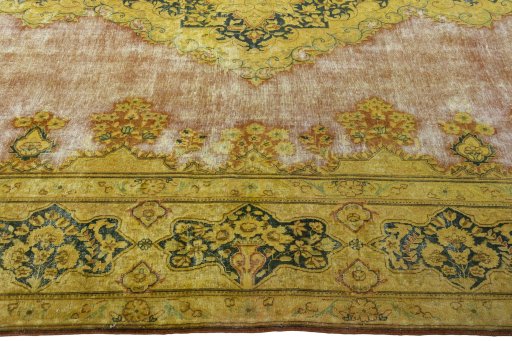 Corner detail of 1950s Vintage rug showing border pattern and Wool pile