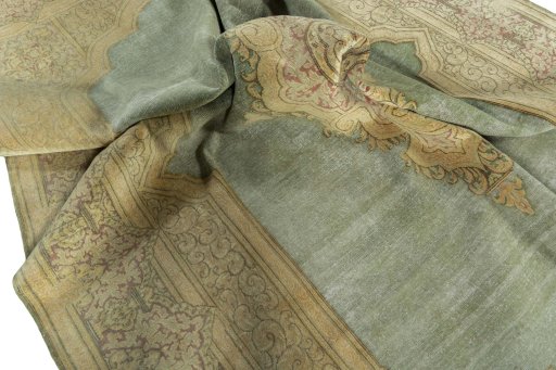 Surface texture of 1950s Vintage rug with natural Wool and intricate pattern