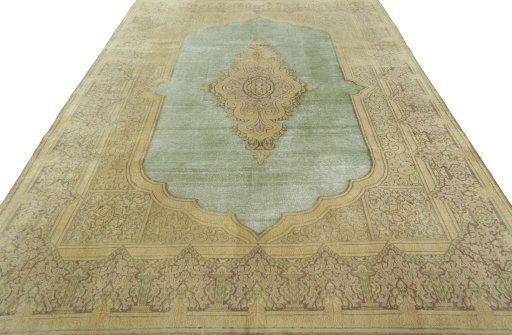 Surface texture of 1950s Vintage rug with natural Wool and intricate pattern