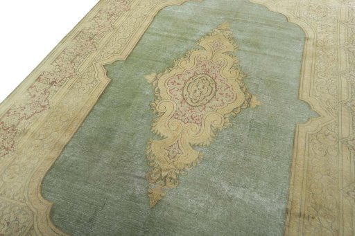 Backside of handmade 1950s Vintage rug showing knot structure and weave density