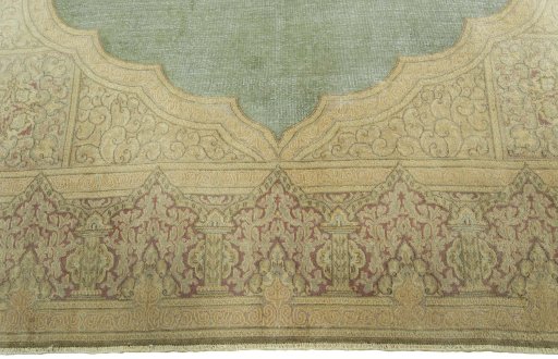 Full view of 1950s Vintage rug from Pakistan, 334 × 232 cm in Green tones