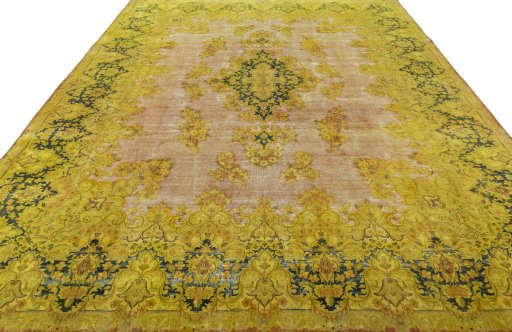 Surface texture of 1950s Vintage rug with natural Wool and intricate pattern