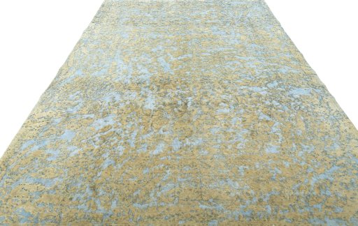 Surface texture of 1950s Vintage rug with natural Wool and intricate pattern