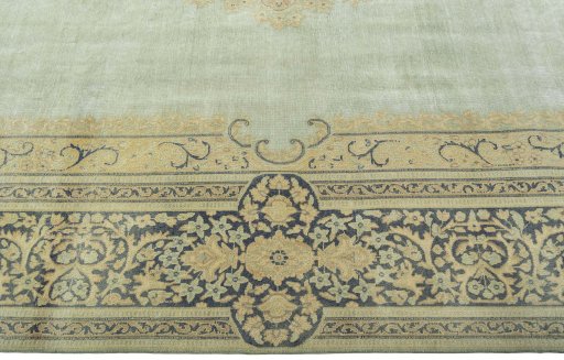 Corner detail of 1950s Vintage rug showing border pattern and Wool pile