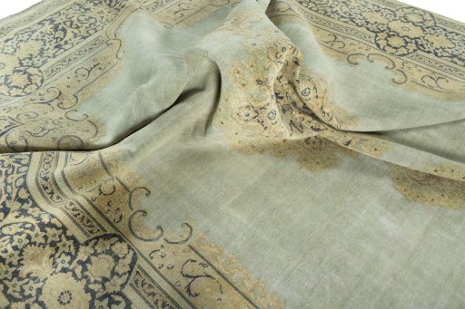 Surface texture of 1950s Vintage rug with natural Wool and intricate pattern