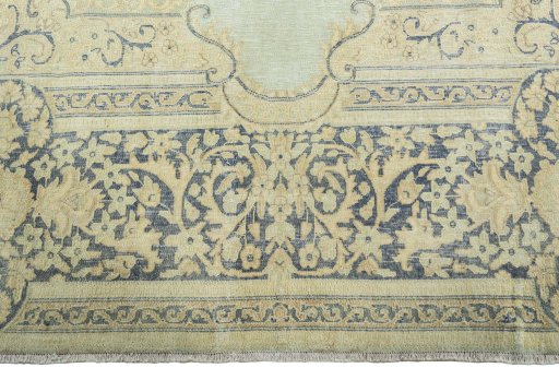 Full view of 1950s Vintage rug from Pakistan, 410 × 300 cm in Green tones