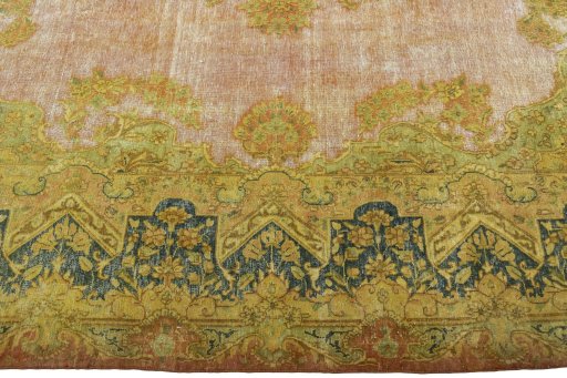 Corner detail of 1950s Vintage rug showing border pattern and Wool pile