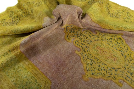 Surface texture of 1950s Vintage rug with natural Wool and intricate pattern