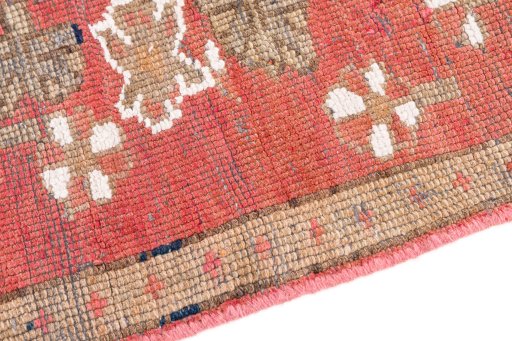 Backside of handmade 1985s Vintage rug showing knot structure and weave density