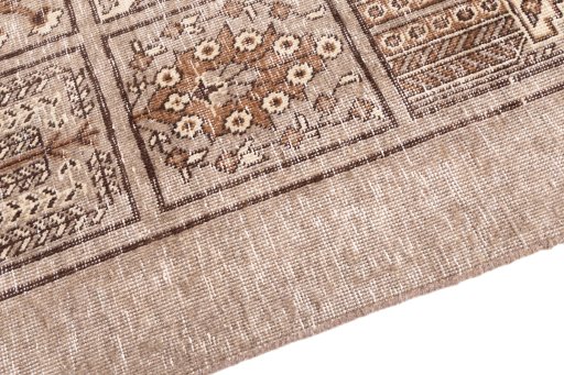 Backside of handmade 1950s Vintage rug showing knot structure and weave density