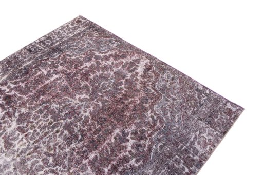 Surface texture of 1950s Vintage rug with natural Wool and intricate pattern