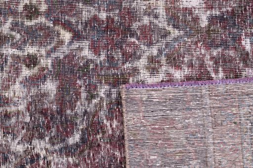 Close-up detail of 1950s Vintage rug from Iran / Persia showing Wool weave