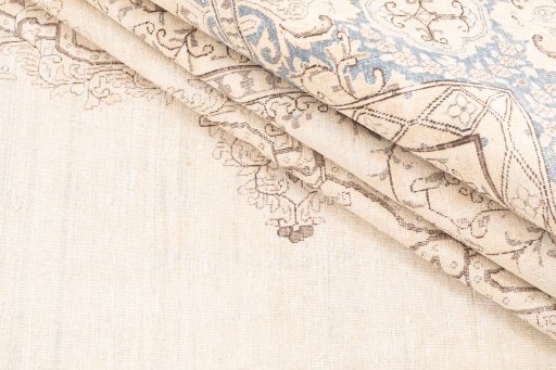 Corner detail of 1950s Vintage rug showing border pattern and Wool pile